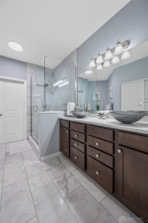 bathroom featuring vanity and walk in shower