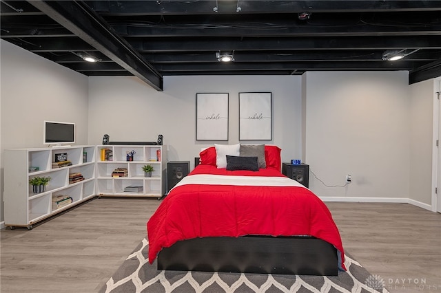 bedroom featuring hardwood / wood-style floors