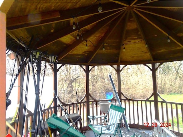 wooden deck with a gazebo