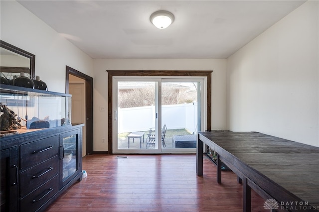 interior space with dark wood-style flooring