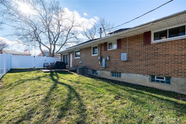 view of yard featuring cooling unit and a fenced backyard