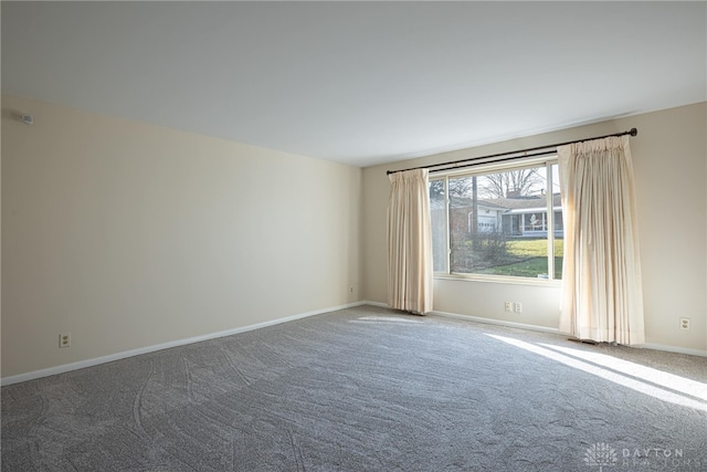 spare room with carpet floors