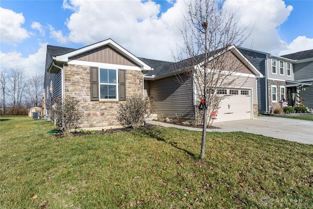 view of front of property with a front lawn and a garage