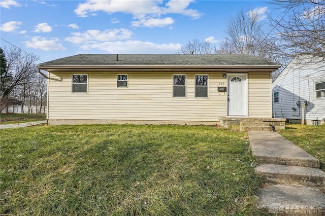 view of front of house with a front lawn