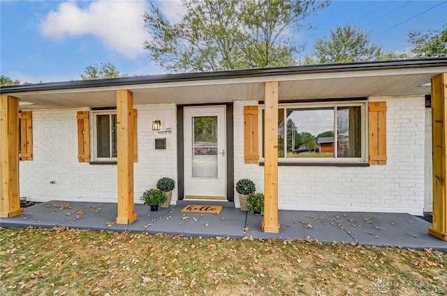 entrance to property with covered porch