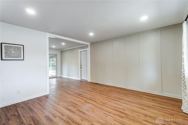 spare room with light wood-type flooring