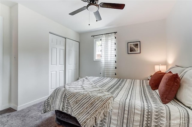 bedroom with carpet, a closet, and ceiling fan