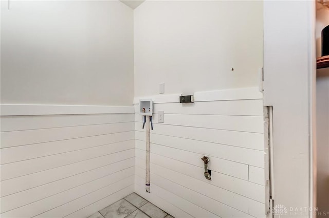 bathroom with tile patterned floors