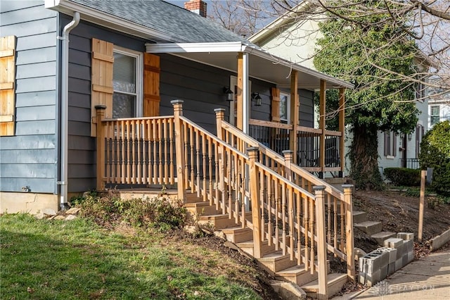 doorway to property with a porch