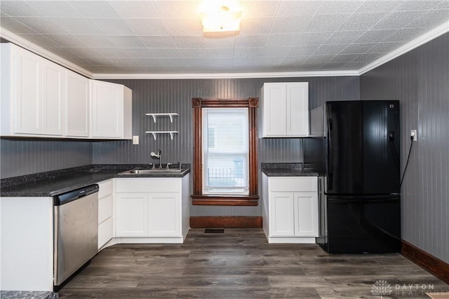 kitchen featuring black refrigerator, stainless steel dishwasher, crown molding, sink, and white cabinets