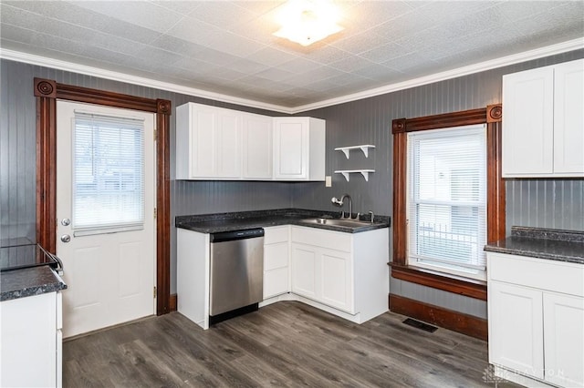 kitchen featuring dishwasher, sink, dark hardwood / wood-style floors, ornamental molding, and white cabinetry