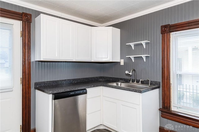 kitchen with dishwasher, white cabinets, and sink