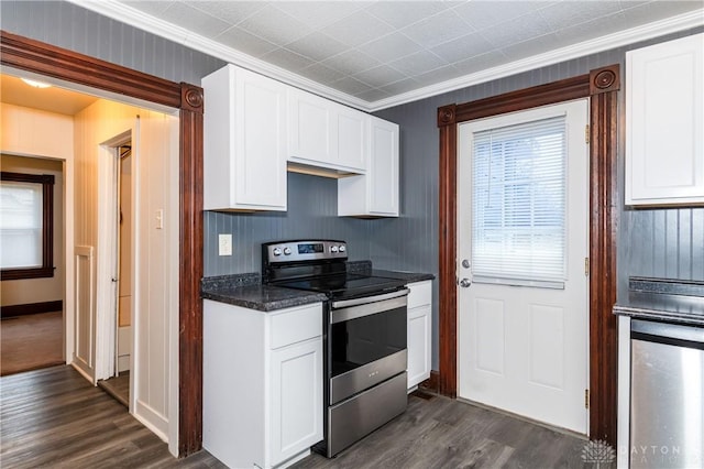 kitchen with white cabinets, dark wood-type flooring, stainless steel range with electric stovetop, and ornamental molding