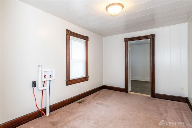 unfurnished room featuring carpet floors