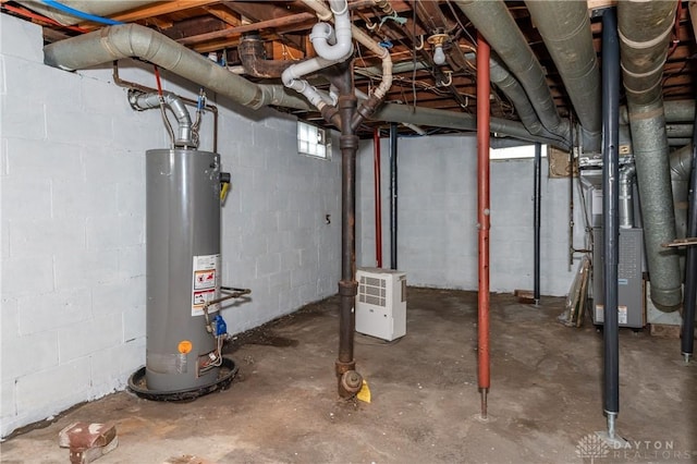 basement featuring water heater