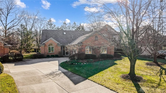 ranch-style home with a front yard