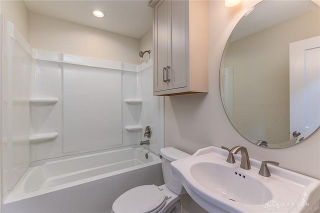 full bathroom with sink, shower / bathing tub combination, and toilet