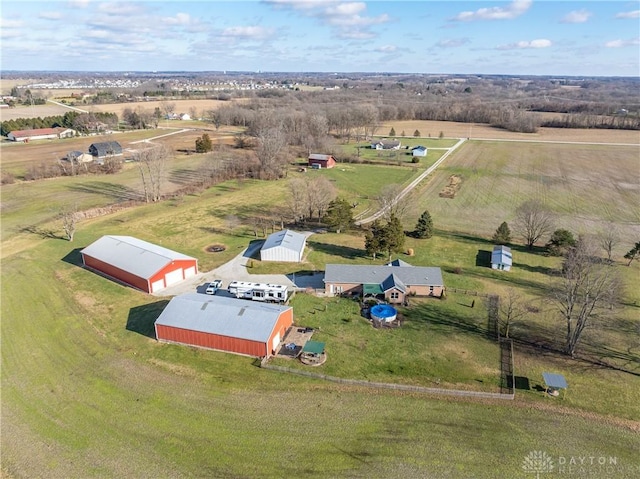 birds eye view of property featuring a rural view