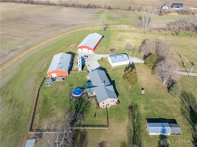 birds eye view of property featuring a rural view