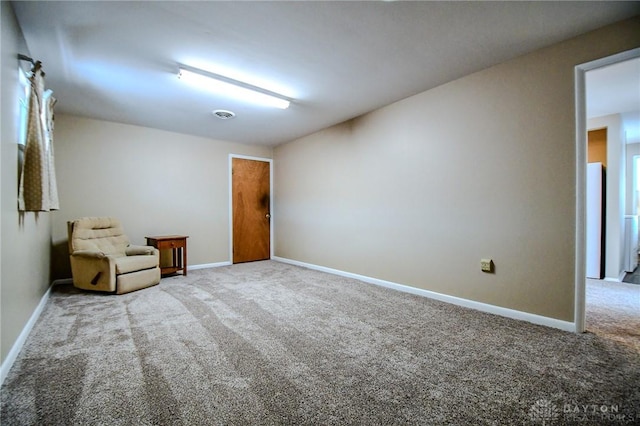 unfurnished room with carpet