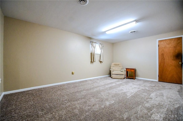 unfurnished room featuring carpet