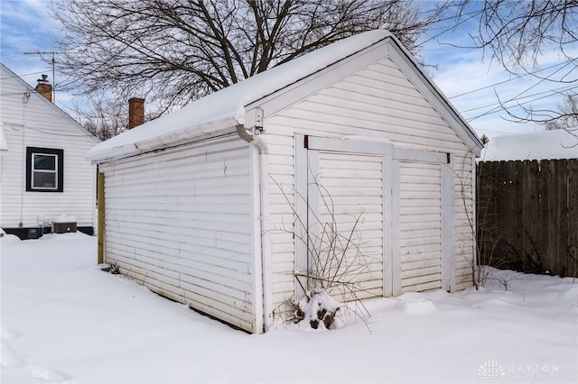 view of snow covered garage