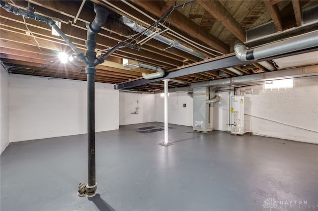 basement with heating unit and water heater