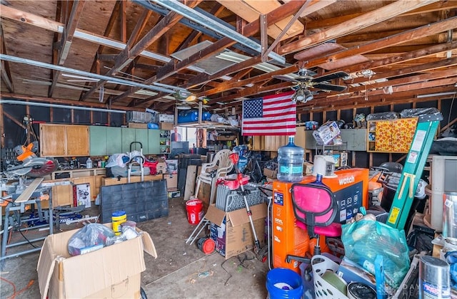 interior space with ceiling fan