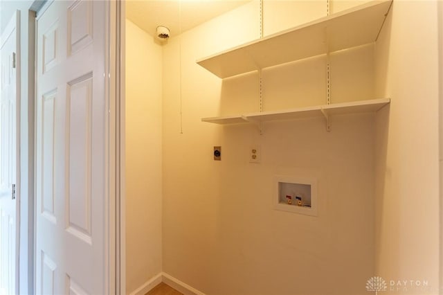 laundry area featuring hookup for a washing machine and hookup for an electric dryer