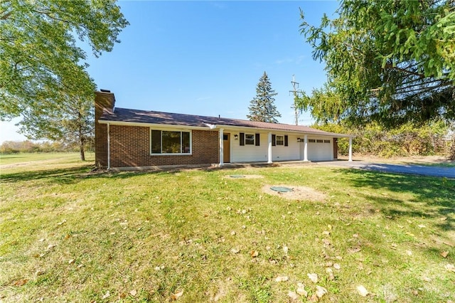 ranch-style house with a front lawn and a garage