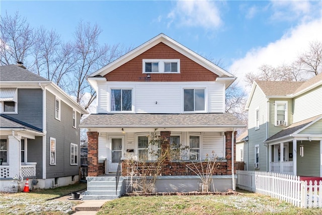 front of property featuring covered porch