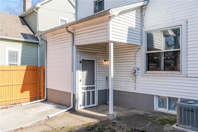 property entrance with central AC unit