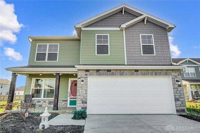 craftsman-style house featuring a garage