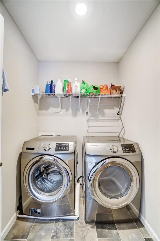 washroom with separate washer and dryer