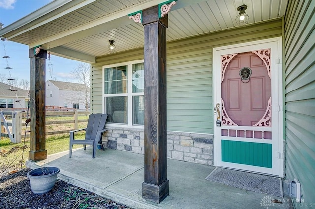 entrance to property with a porch