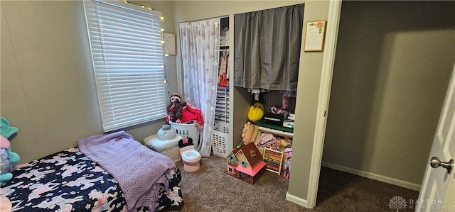 bedroom with dark carpet