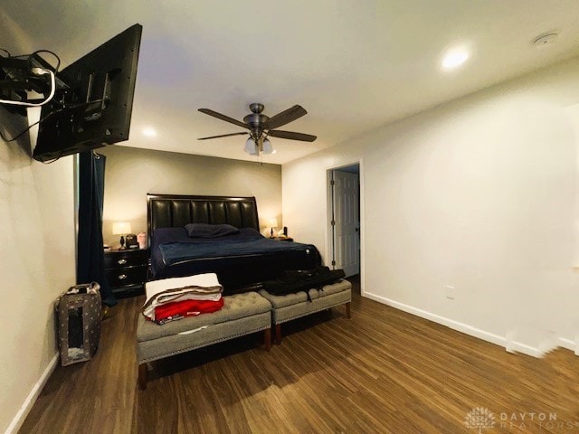 bedroom featuring dark hardwood / wood-style floors and ceiling fan