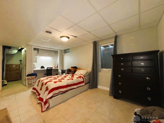 bedroom featuring a paneled ceiling