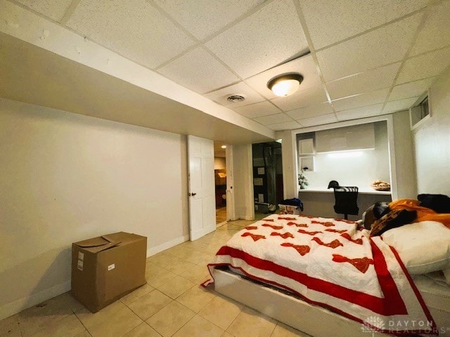 bedroom with a drop ceiling