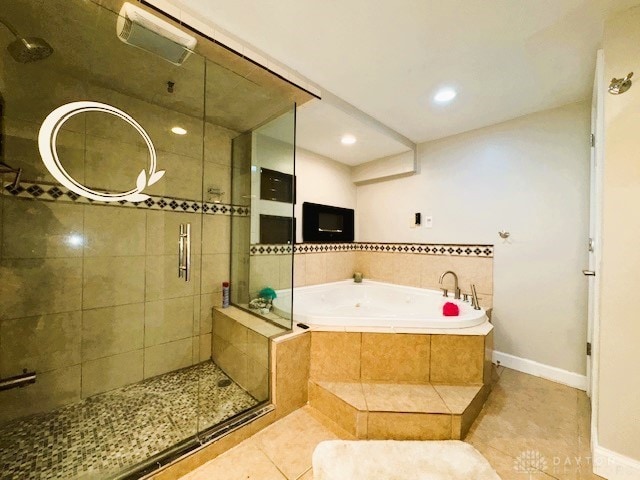 bathroom featuring tile patterned flooring and plus walk in shower