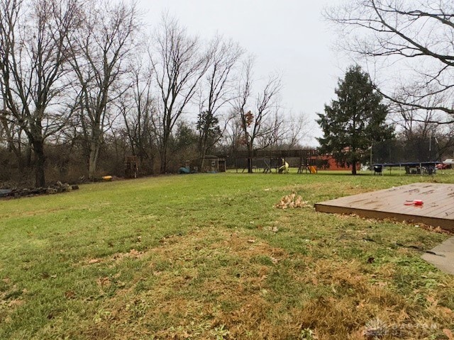 view of yard featuring a wooden deck