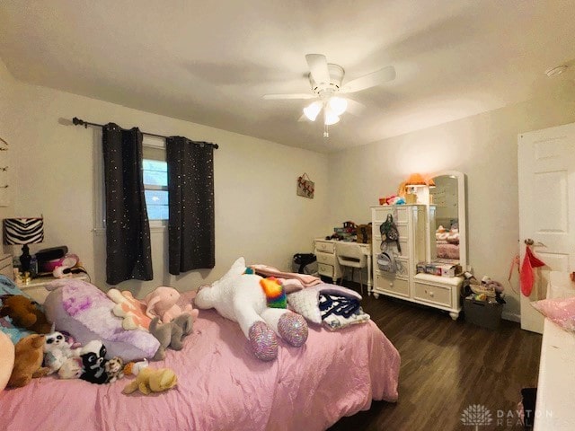 bedroom featuring ceiling fan and dark hardwood / wood-style flooring