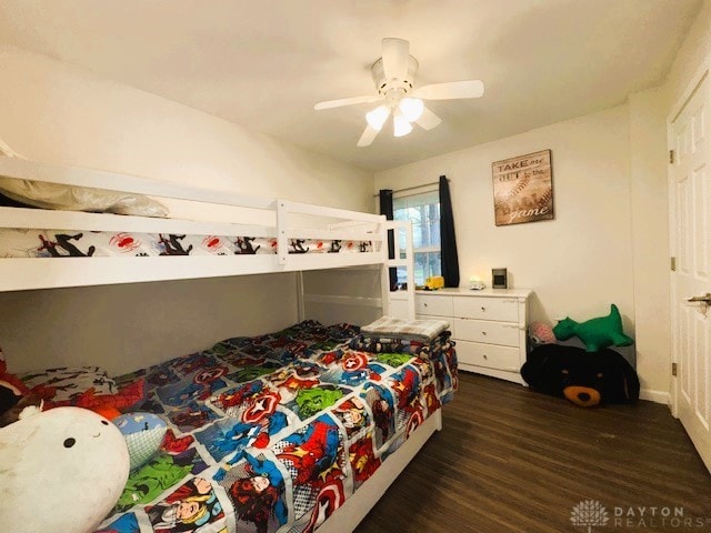 bedroom featuring ceiling fan and dark wood-type flooring