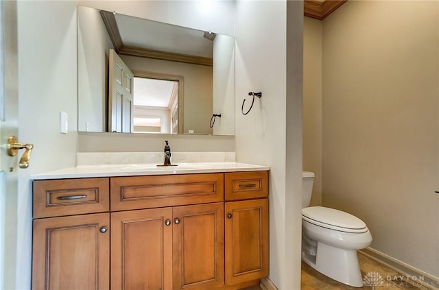 bathroom featuring tile patterned flooring, vanity, and toilet