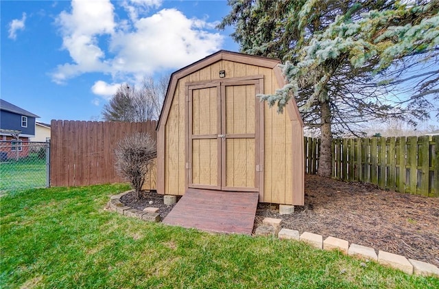 view of outdoor structure with a lawn