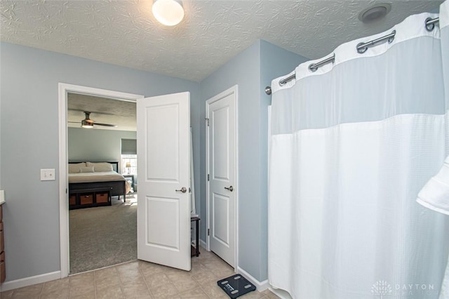 bathroom with vanity and ceiling fan