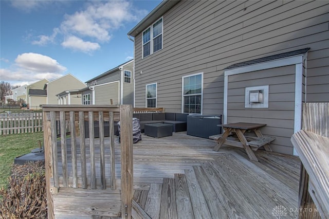 wooden deck featuring outdoor lounge area