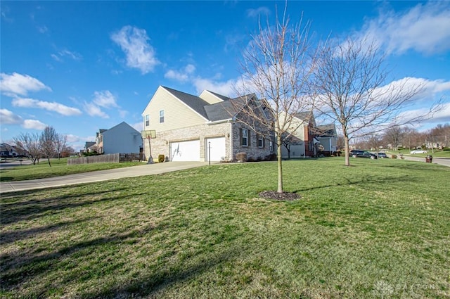 view of home's exterior with a yard and a garage