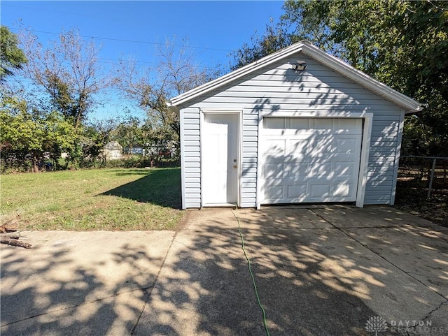 garage with a lawn