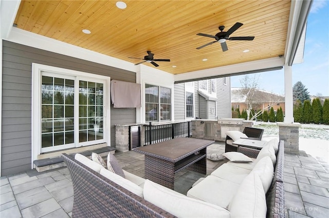 view of patio / terrace featuring an outdoor hangout area, area for grilling, and a ceiling fan